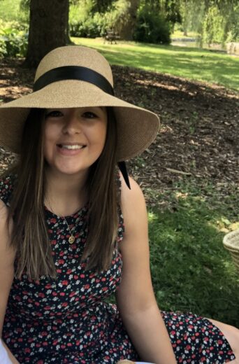 Picture Of Laura Sitting Down In Park